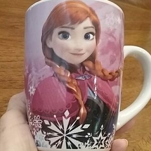 Disney coffee cup.